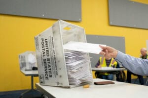 Postal Service moves ahead with mail ballot rule amid court battle