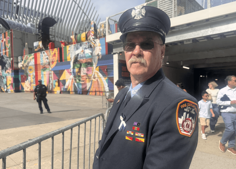 Bob Lee, 67, flew in from Kansas City, Missouri to attend the 25th anniversary of 9/11 in New York City. on Sept. 11, 2026. As a firefighter in the Bronx, he was one of the many first responders who helped clean up the debris created in the aftermath of the terrorist attacks on the World Trade Center. (Photo by Shalina Chatlani/ Stateline).