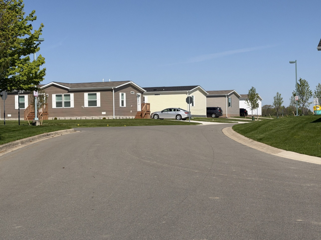 Burkhart Ridge in Howell Township, Mich., is the kind of manufactured home community that some experts say can be expanded with a new federal law that allows such homes to be built without a chassis. Some 30 states may need to update their laws, though, and mobile home park operators say the industry still faces major zoning and financial speed bumps. (Photo by Jon King/Michigan Advance)